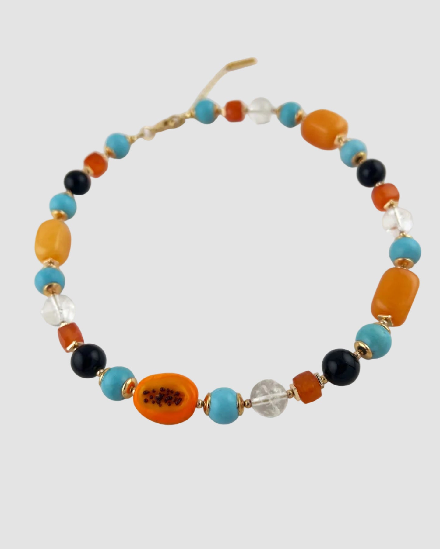 Necklace with multicolored beads on a white background