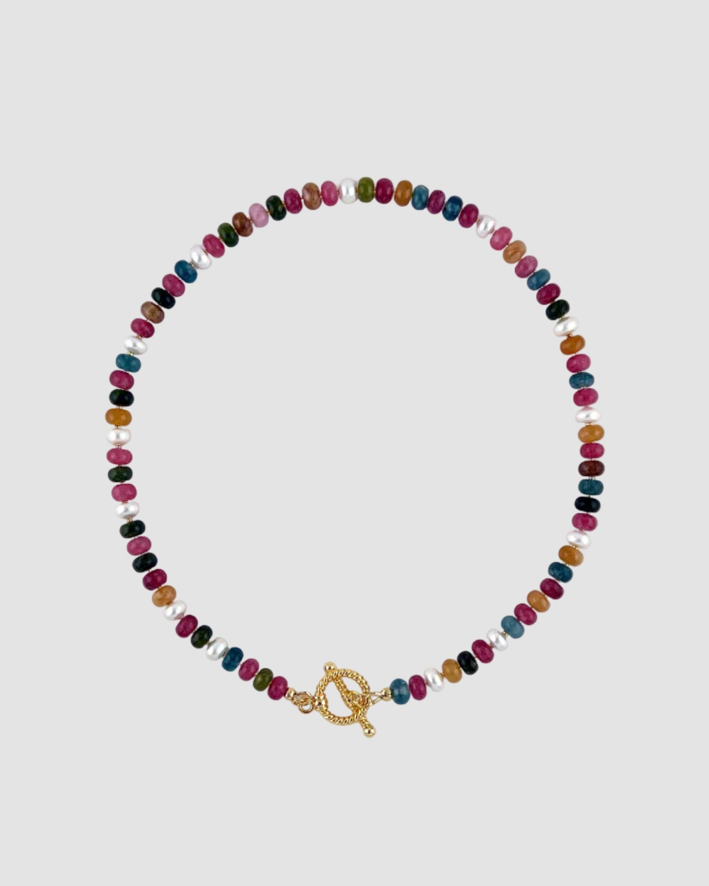 Multicolored beaded necklace with a gold clasp on a white background