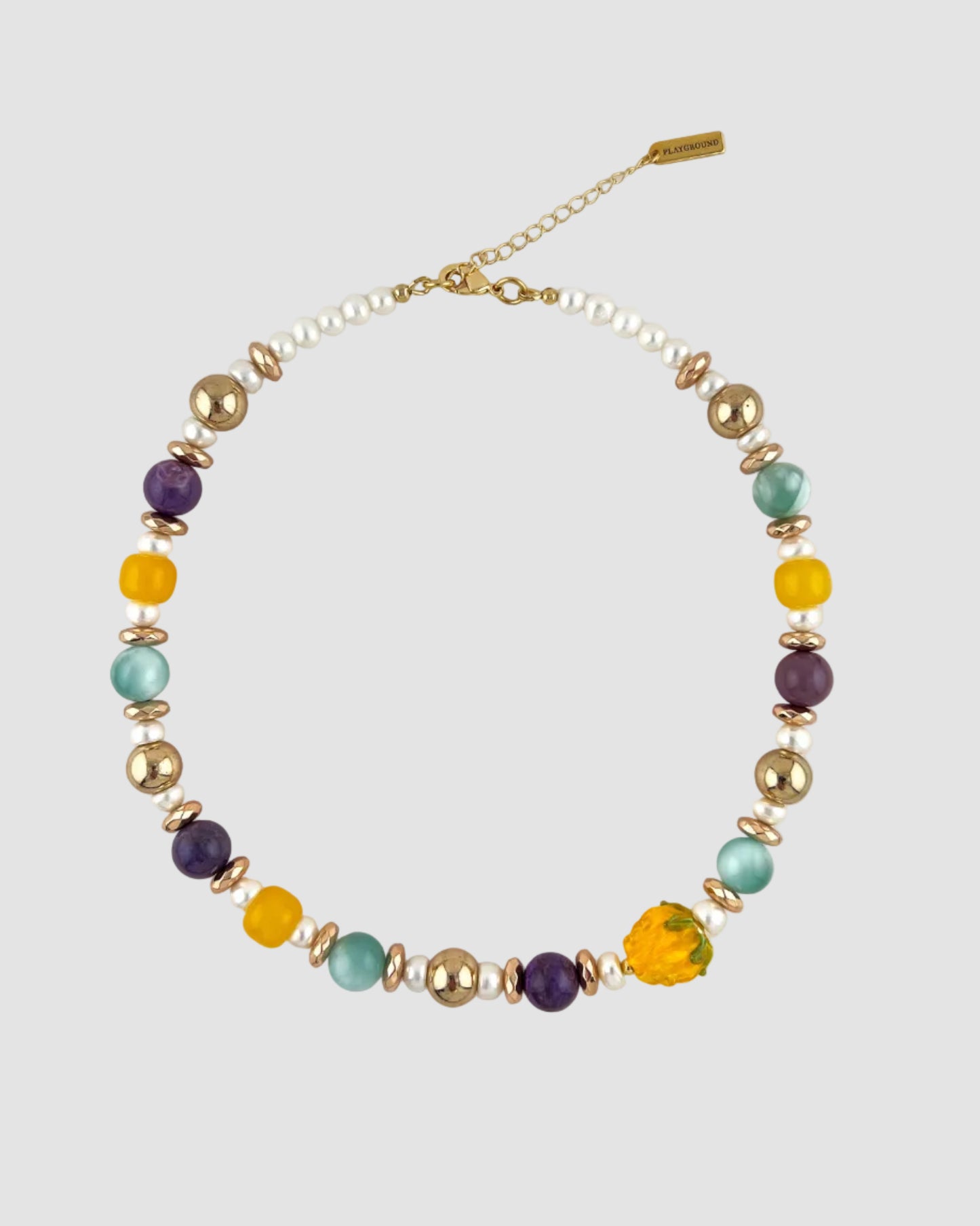 Necklace with multicolored beads on a white background